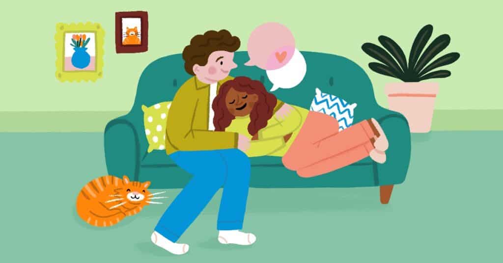 Couple on the couch talking